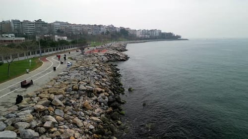 Drone fly forward shot of Istanbul Turkey park and seaside