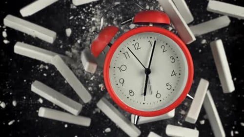 Alarm Clock and School Crayons Fly Up on a Black Background Filmed on a Highspeed Camera at 1000 Fps