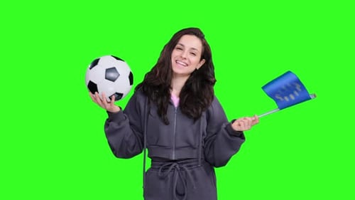 Woman Smiles with Soccer Ball and Flag