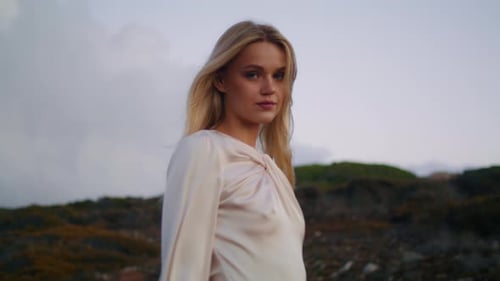 Serious Girl Walking Nature with Green Plants Closeup. Thoughtful Woman Moving Across