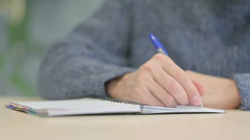 Close up of Man Writing a Letter