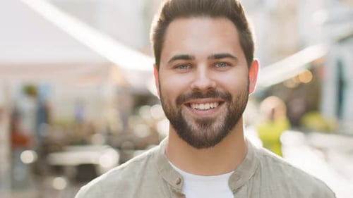 Happy Young Man Smiling Looking Away Dreaming Resting Good News Feel Satisfied in City Street