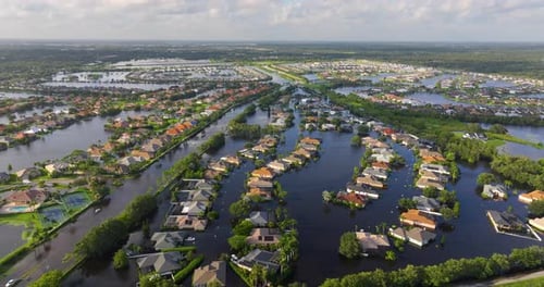 Flooded Residential Area with Underwater Houses From Hurricane Rainfall Water in Florida Suburban