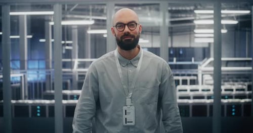 Technical Expert With Warm Professional Expression in Data Center Control Room