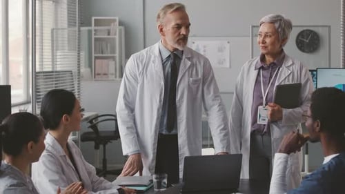 Medical Team Meeting in Bright Workspace
