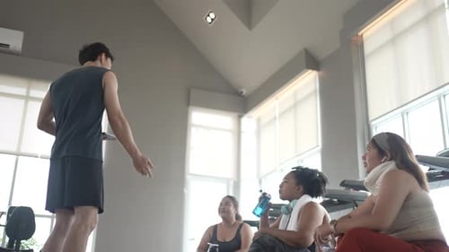 chubby women workout at fitness center.