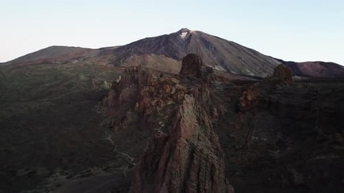 Mountain range in dry deserted landscape of Teide National Park. Scenery of highest volcano