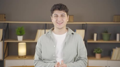 Portrait of excited positive young man.