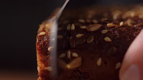 Food Cooking, Baking and People Concept - Close Up of Knife Cutting