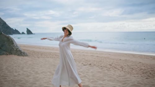 Joyful Model Dancing Beach on Cloudy Day Happy Carefree Woman Enjoying Summer