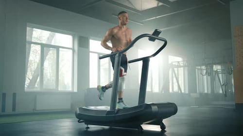 Process of Running on Treadmill in Gym By Young Handsome Fit Sportsman