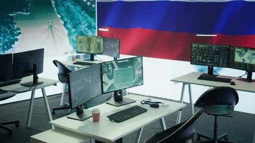 Empty Office with Computers and Russian Flag