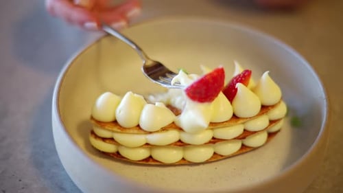 Pastry with Cream and Strawberries in Bowl