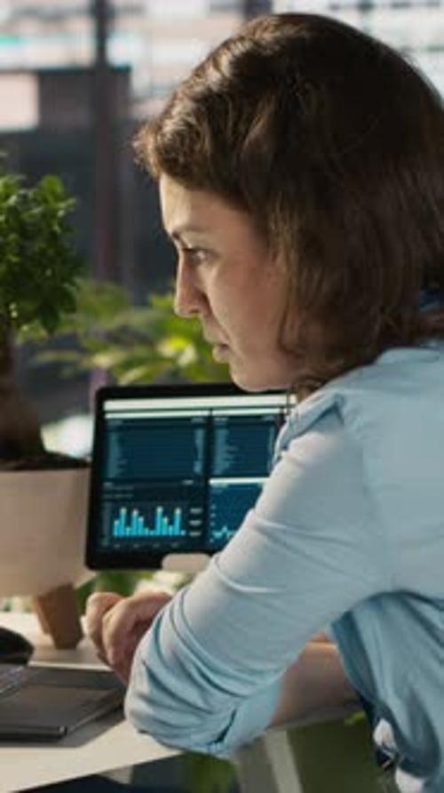 Vertical Video Employee in Office Getting Upset After Noticing Mistake While Editing Documents