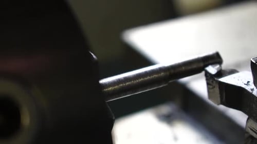 Metal Rod Being Machined in Workshop