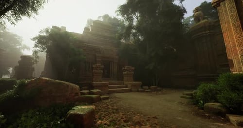 Ancient Temple Ruins Enveloped in Misty Forest at Dawn in Cambodia