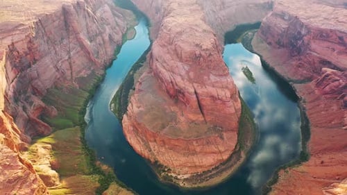 Cinematic shot , aerial drone view of famous Horseshoe Bend on the Colorado river and most iconic to