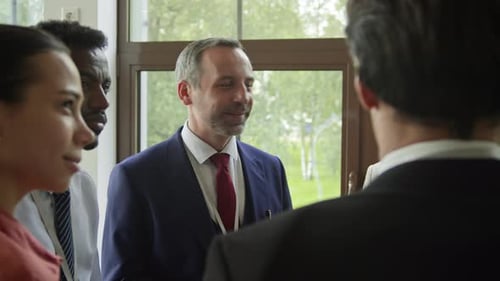 Diverse Business Professionals Meeting in Office Setting