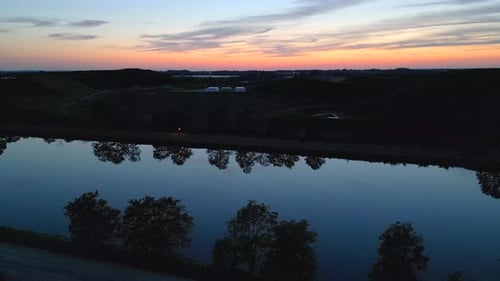 Aerial view of Sunset over riverlike stream