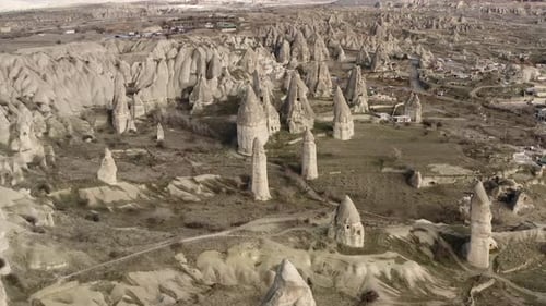 Aerial video of a panoramic view of natural rock formations in Cappadocia, Turkey