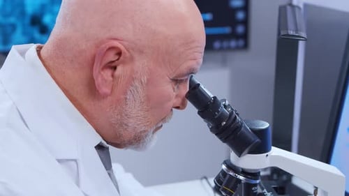 Scientist Using Microscope for Research in a Lab