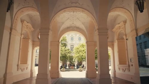Building Facade Seen Through Arches and Columns
