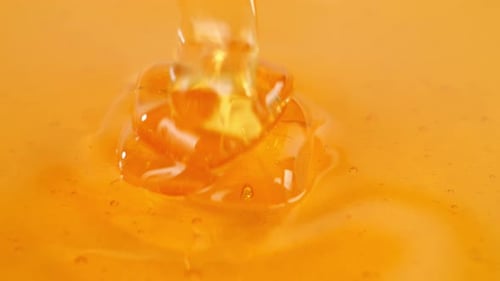 Loop Of Thick Honey Dripping, Pouring Honey On Honey, Close Up Sweet Dessert