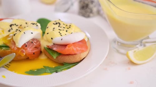 Tasty Benedict Egg Breakfast Salmon Fillet Sandwich with Cream Cheese and Poached Egg at Domestic