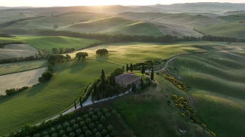 Aerial video on the hills of Tuscany in San Quirico, Belvedere view at sunrise - Tuscany