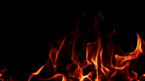 Die Zungen der hellen Feuerflamme in Superzeitlupe