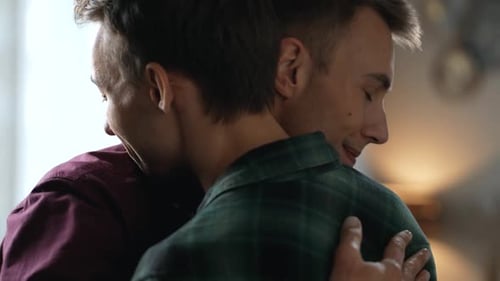 Affectionate Couple Embrace Indoors