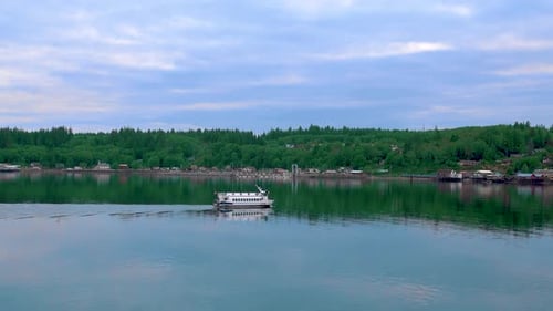 The ferry is sailing on the lake in the gorge.