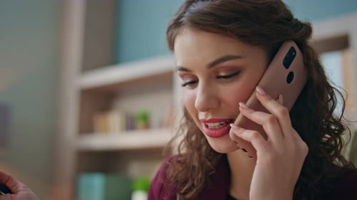 Woman Talking on Cell Phone in Home