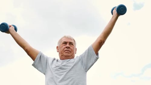 Senior Man Working Out Outdoors Person Lifting Dumbbells Old Male Exercising at Park Healthy People