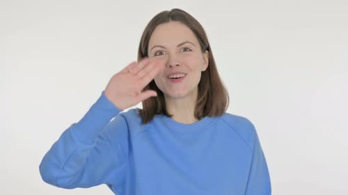 Young Woman Waving Hand to Say Hello on White Background