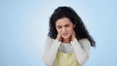 Pain, neck and injury of woman in studio with stress, risk of arthritis