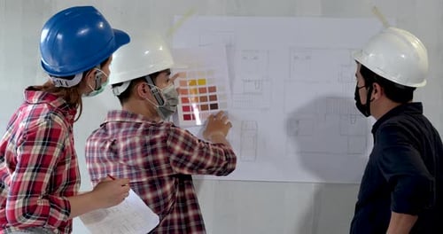 Group of young asian of building architect construction engineer have meeting