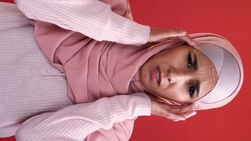 Woman Massaging Temples with Headache