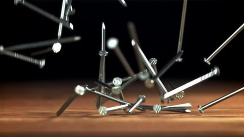 Nails Fall on the Carpenter's Worktable Filmed on a Highspeed Camera at 1000 Fps
