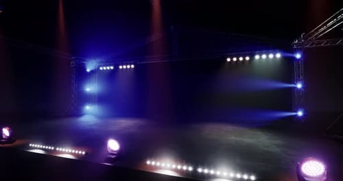 Dynamic Event Stage with Moving Spotlights Logo Reveal