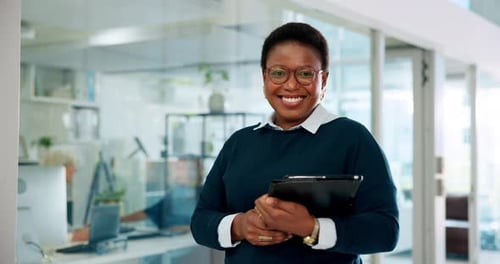 Black woman, face and happy with tablet in office for networking, internet and online news website