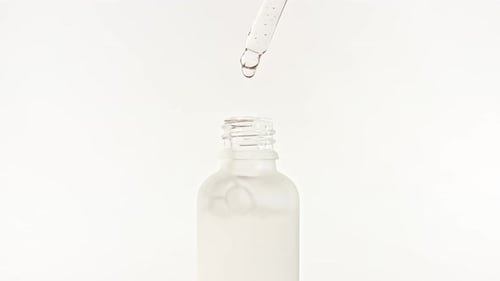 Cosmetic Bottle with Pipette on White Background Cosmetic Spa Medical Skin Care Advertising of a