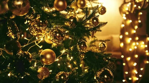 Golden Christmas Tree with Lights and Ornaments