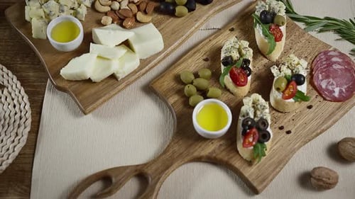 Delicious Assortment of Gourmet Appetizers on Wooden Boards