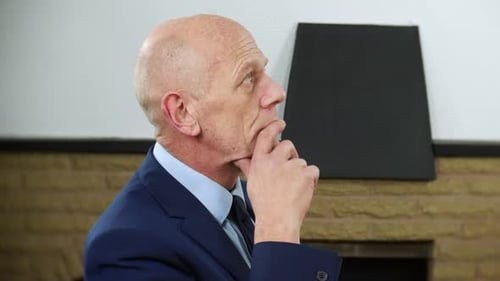 Mature Adult Ponders, Close-Up