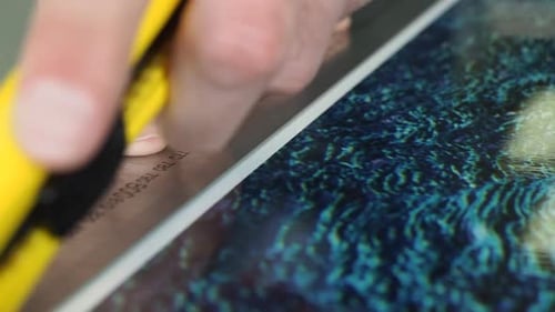 Art creating Acrylic prints of photographs in studio for artist wall art.