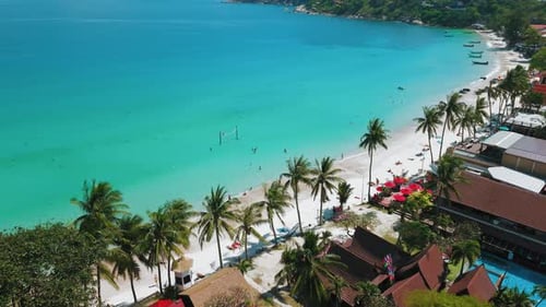 Aerial View of Tropical Coastline with Turquoise Sea and White Sand Beach Palm Trees Beach Resorts