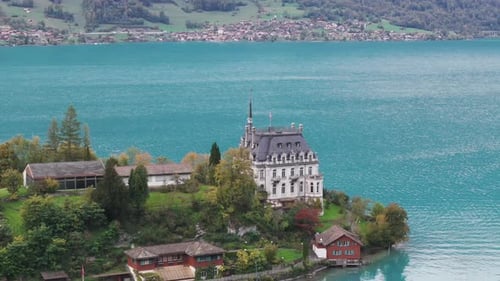 Aerial view of picturesque fishing village Iseltwald on Lake Brienz, Switzerland