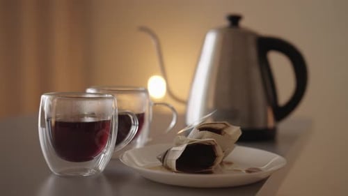 Fresh Brewed Coffee in Glass Cups With Kettle