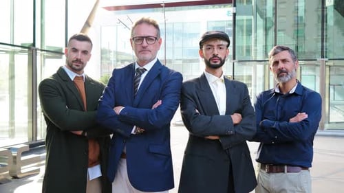 Business Professionals Standing Confidently Outside Modern Office Building